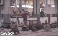Dutch marine resting on his field bed inside a train depot at Camp Smitty, 28 July 2003